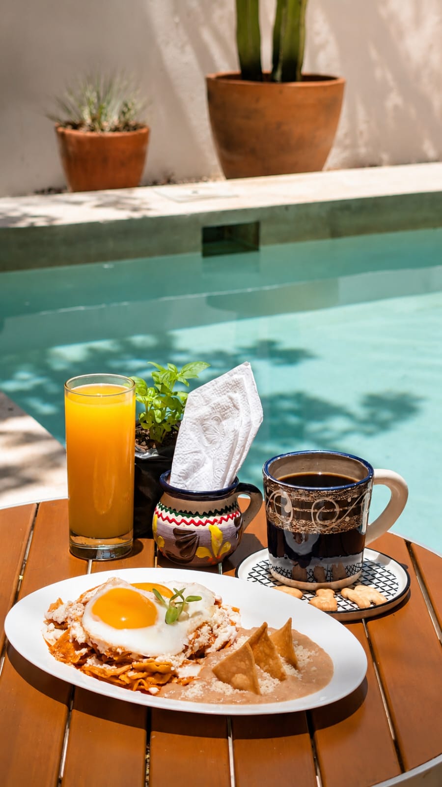 Chilaquiles and café de olla by the pool