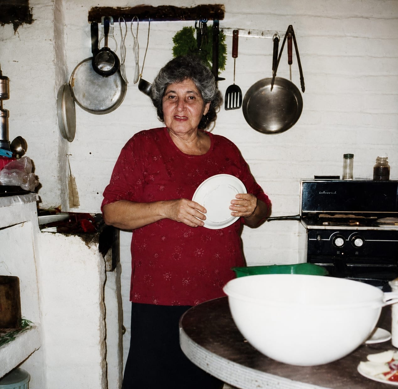 Elodia 'Yoya' Rivera Gallegos in her traditional Mexican kitchen